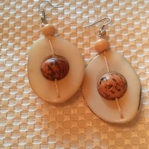 3" oval pierced earrings.